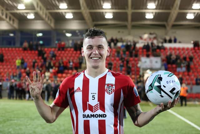 David Parkhouse celebrating with the matchball after scoring four goals against Waterford in the EA Sports Cup during his memorable first spell with Derry City.