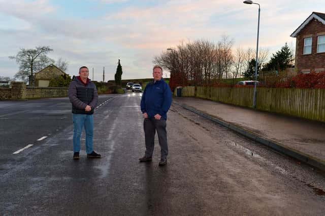 Christopher Sherrard founded the Life After support group and Alliance Colr. Philip McKinney pictured at Rossdowney Road in the Waterside. The two men have successfully campaigned to have the speed limit reduced from 60MPH to 30MPH on a stretch of the road adjacent to Ballyoan Cemetery. DER2202GS – 080
