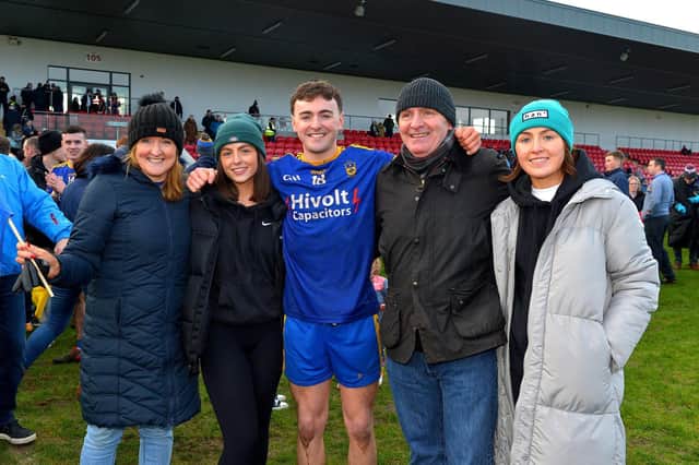 Steelstown hero Cahir McMonagle pictured with his family after shooting five of the club's six points in the Ulster Final.