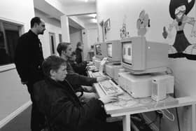 Bogside and Brandywell teenagers try out new computer stations at the Powerhouse under the watchful eye of centre co-ordinator Dougal McPartland.