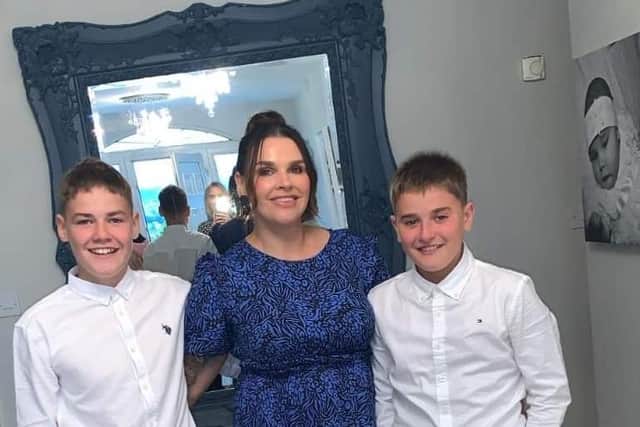 Rocco, with his mother Yvonne and brother, Cooper.