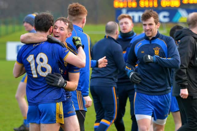 Steelstown's Eoghan Bradley embraces team-mates Cahir McMonagle at the finals whistle of the Ulster Intermediate Club Football Championship Final at Owenbeg on Sunday afternoon last. DER2202GS- 061 (Photo: George Sweeney)