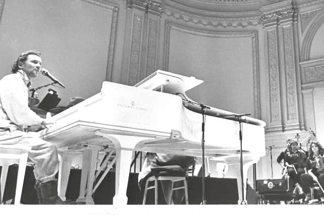 Phil Coulter performing at Carnegie Hall with accompanying orchestra in 1988