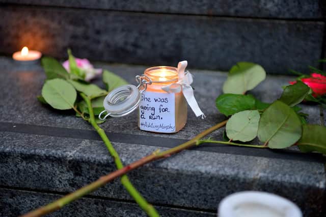 Candle and message at the vigil for Ashling Murphy held at the Guildhall Steps on Friday afternoon. Photo: George Sweeney. DER2202GS – 081