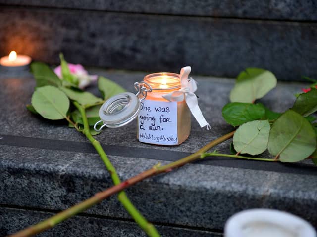 Candle and message at the vigil for Ashling Murphy held at the Guildhall Steps on Friday afternoon. Photo: George Sweeney.  DER2202GS – 081