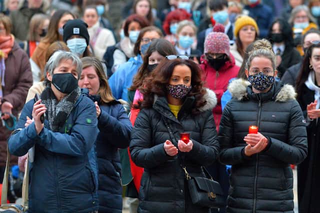 Some of the attendance at the vigil for Ashling Murphy held at the Guildhall on Friday. Photo: George Sweeney. DER2202GS – 095