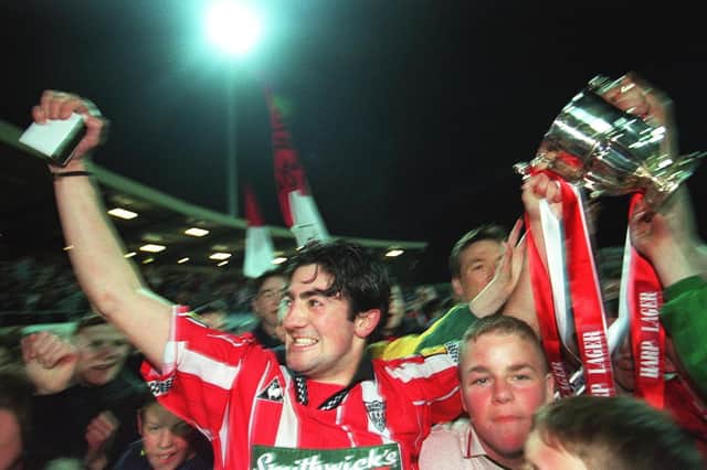 Peter Hutton celebrates winning the Premier Division title back in 1997.