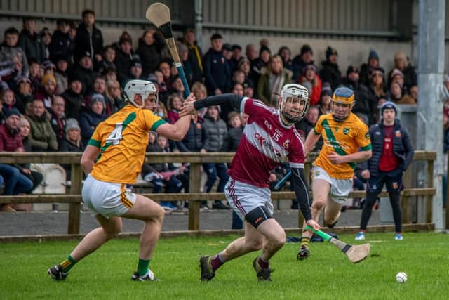 Banagher's Stefan McCloskey gets away from Kilmoyley's Flor McCarthy during Sunday's All Ireland Intermediate Club semi-final in the Connacht Centre of Excellence. (Photograph by Ciara Buckley)