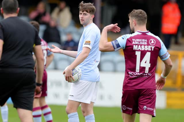 Derry City’s Will Patching, one of several new signings likely to feature against Institute, has words with Drogheda United’s Dane Massey during Saturday’s friendly. Picture by Kevin Moore/MCI