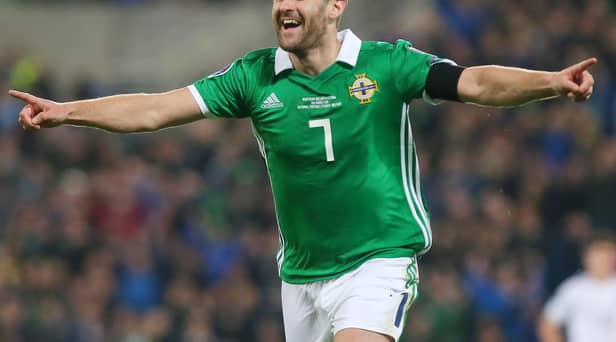 Niall McGinn has signed for Dundee.