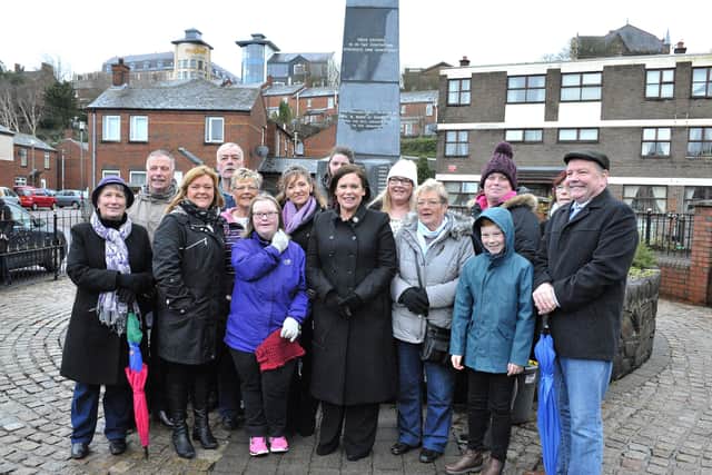 Mary Lou McDonald pictured with relatives of the Bloody Sunday victims, Martina Anderson, Sinn Féin and others the memorial in the Bogside several years ago.