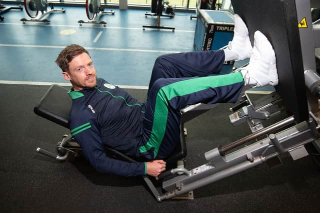 North West Warriors player Craig Young tries out the leg press machine during training.