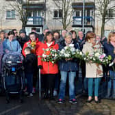 Relatives and locals pictured at the annual service at the Bloody Sunday Memorial, Rossville Street at a previous commemoration. DER0620GS - 009