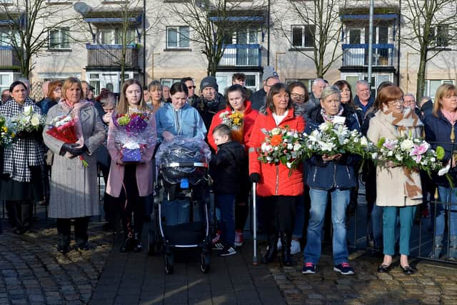 Relatives and locals pictured at the annual service at the Bloody Sunday Memorial, Rossville Street at a previous commemoration. DER0620GS - 009