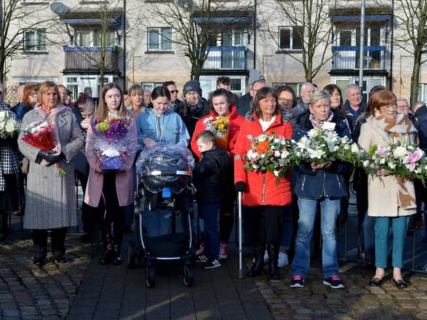 Relatives and locals pictured at the annual service at the Bloody Sunday Memorial, Rossville Street at a previous commemoration. DER0620GS - 009