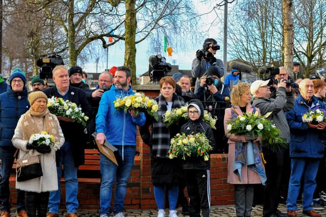 Relatives with wreaths at the Bloody Sunday Monument during the 50th anniversary Memorial Service at Rossville Street on Sunday morning. Photo: George Sweeney, DER2205GS – 019