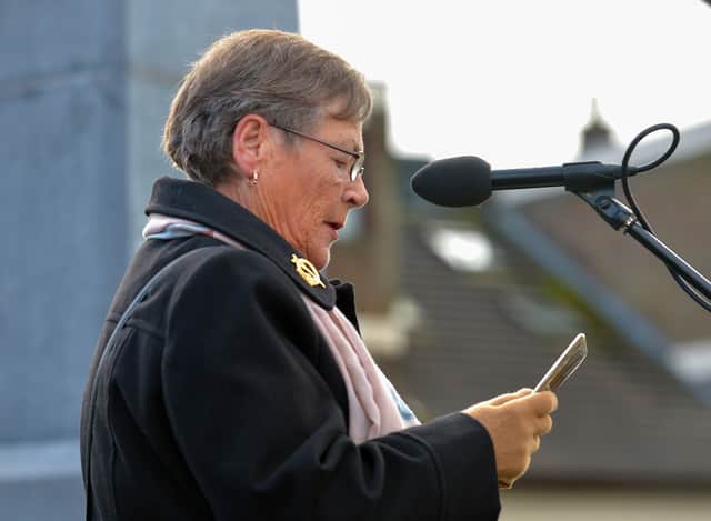 Kay Duddy reads a prayer at the 50th anniversary Memorial Service held at the Bloody Sunday Monument on Rossville Street on Sunday morning. Photo: George Sweeney, DER2205GS – 011