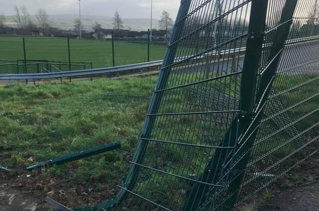 A fence that was significantly damaged at the weekend.