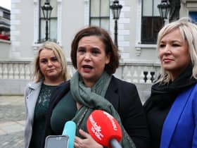 Mary Lou McDonald, centre, flanked by Sandra Duffy and Michelle O'Neill.