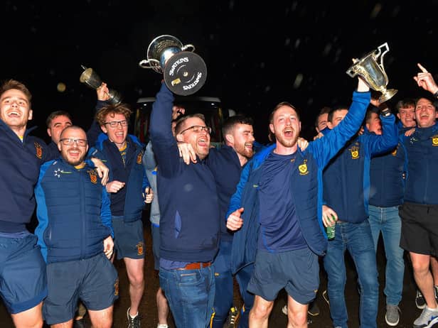 Brian Og’s team manager Hugh McGrath and captain Neil Forester lead the Derry, Ulster and All Ireland Intermediate Football Champions homecoming at Steelstown on Monday evening.  Photo: George Sweeney.  DER2206GS – 067