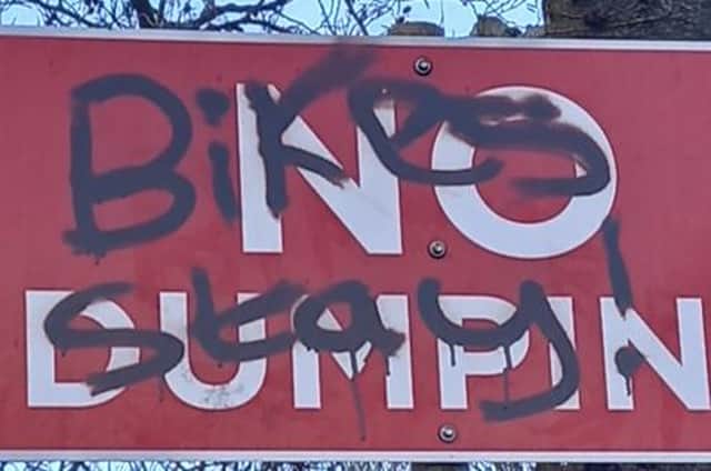 A sign at Ballyarnett Park which has been vandalised.
