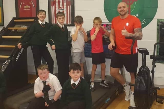 EXCEL’s Daniel ‘Pinta’ Quigley pictured with young students from St Joseph’s Boys School who took part in one of his recent programmes.