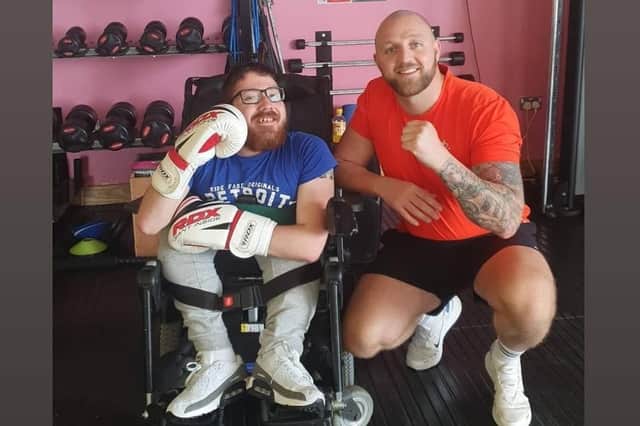 EXCEL’s Daniel ‘Pinta’ Quigley poses for a photograph with Jim O’Brien after one of his sessions.