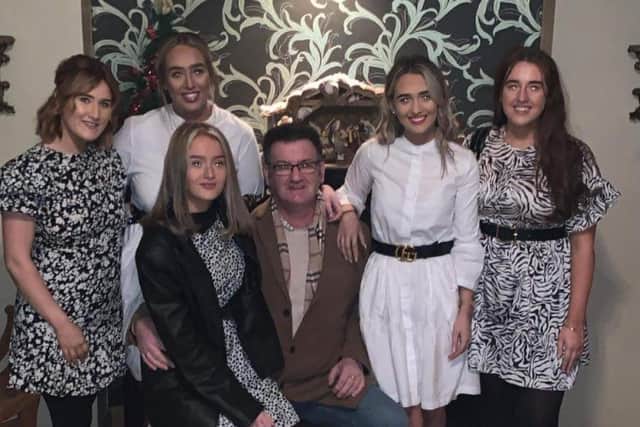 Jim McLaughlin, pictured with his five daughters.