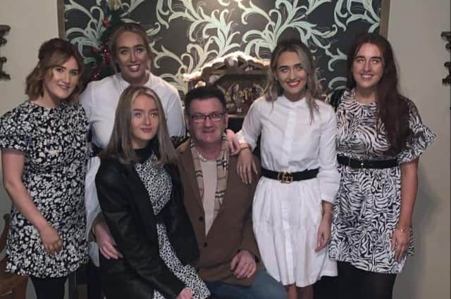 Jim McLaughlin, pictured with his five daughters.