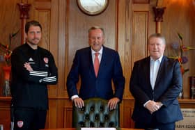 Derry City chairman Mr Philip O'Doherty (right) pictured with manager Ruaidhri Higgins and club President Mr Paul Diamond.