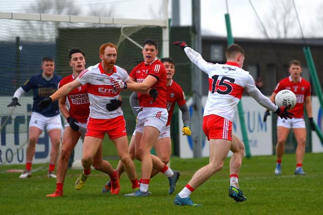 Lachlan Murray scores a point for Derry against Cork at Owenbeg on Sunday afternoon last. Photo: George Sweeney. DER2208GS – 005