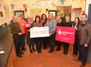 (L-R) Edward Robinson, Brighter Ballymagorry Development Group, Noelle Hall, Artigarvan Community Response, Anne Bradley, Plum Club, Caroline Lynch, Learmount Community Development Group, Bronagh Kearney, Glenelly Development Trust, Lorraine Gallen, The National Lottery Community Fund, Catriona Doughty, Learmount Community Development Group, Teresa McGaughey, Dennett Interchange, Susan Doherty, DCSDC, and Philip O’Kane, RAPID, (MMaryy x)