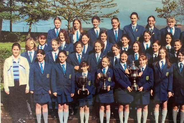 A prizewinning choir from Thornhill College in 2003.  Mairead is pictured at the far right of the front row.