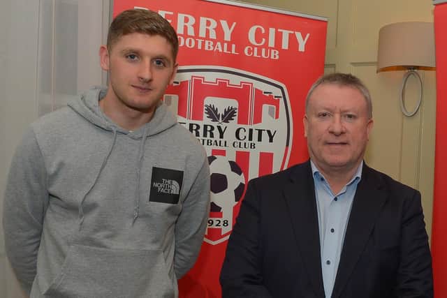 Derry City defender Ronan Boyce pictured alongside chairman Philip O'Doherty. Picture by George Sweeney
