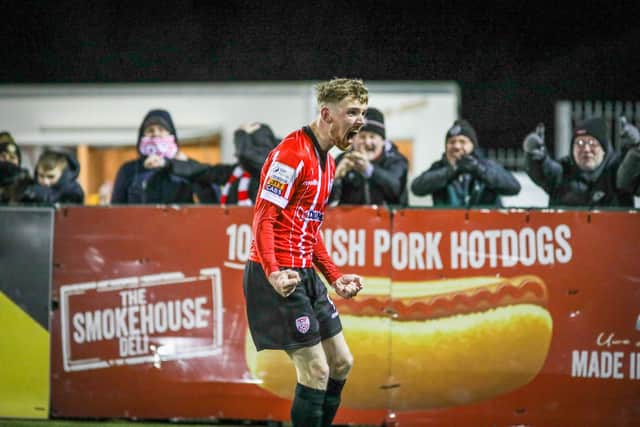 Jamie McGonigle celebrates his equalising goal but should he have been awarded a penalty at Oriel Park?