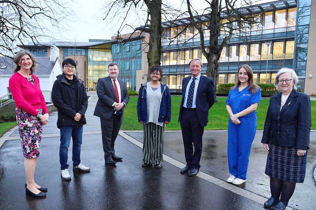 Professor Neil Mortenson (third from right) with students and staff at the UU School of Medicine in Derry.