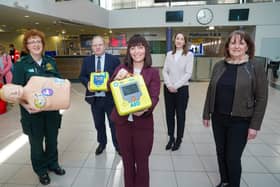 Minster Mallon is pictured with left to right: Jacqueline O'Neill, Community Resuscitation Officer, NIAS; John Glass, Translink Director of Infrastructure and Projects;  Denise McAnena, Policy Manager, British Heart Foundation NI and Lynda Donaldson.