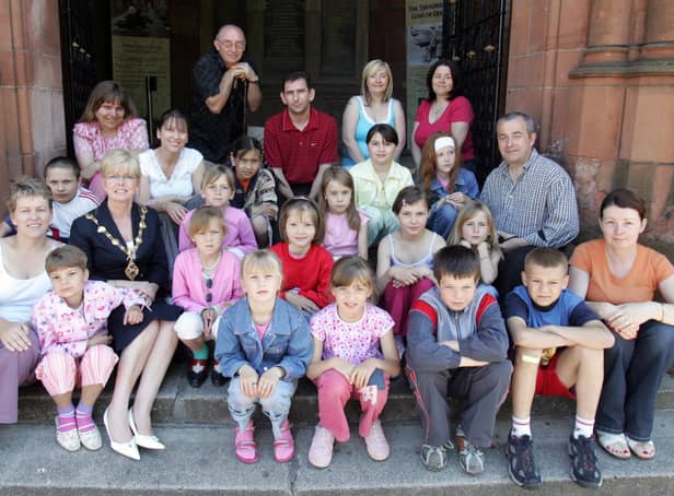 2006: The then Mayor of Derry Helen Quigley, with children from Chernobyl, host familes and members of the Foyle and Inishowen Branch of Chernobyl Childrens Project International at a reception in the Guildhall. (3006C23)