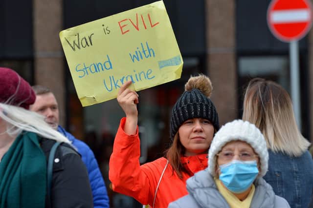 Demonstrator with placard at the Derry Anti-War Coalition’s ‘No to War - Oppose Putin’s Invasion - Stop NATO expansion’ rally at the Diamond on Saturday afternoon last. Photo: George Sweeney. DER2208GS – 106