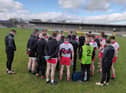 Derry manager Rory Gallagher talks tom his players after Sunday's nine point defeat of Clare in Cusack Park, Ennis.