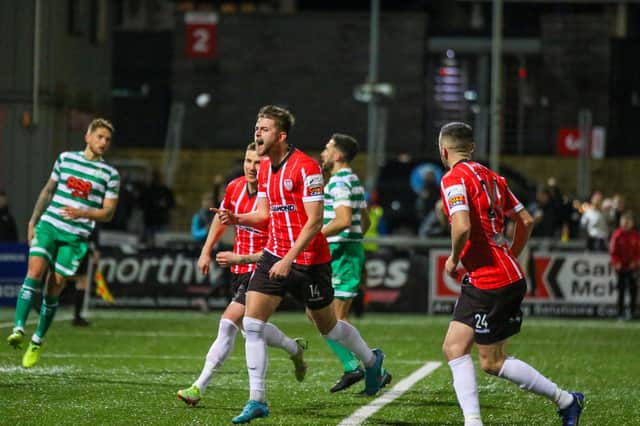 Will Patching celebrates scoring from the penalty spot in the second half of Friday's clash with Shamrock Rovers.