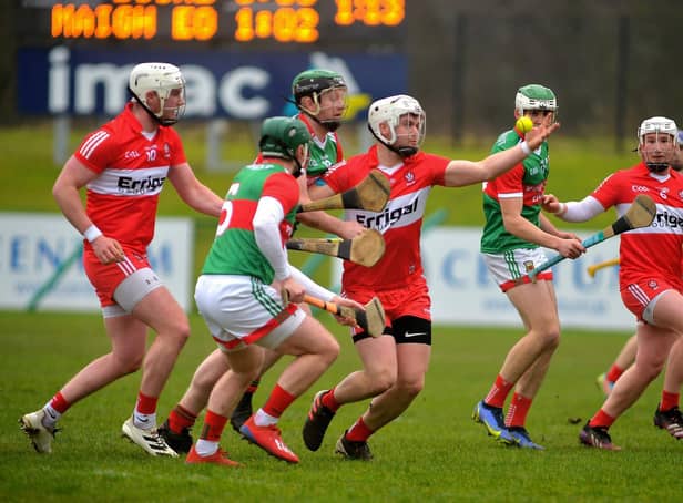 Derry ‘s Eamon McGill gain possession under pressure from Mayo’s Brian Hunt at Owenbeg on Sunday afternoon last. Photo: George Sweeney. DER2209GS – 002