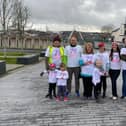 Marie Ward pictured with her family after completing her ‘79 Walks for Dementia’ at Ebrington Square on Friday.
