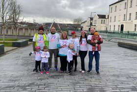 Marie Ward pictured with her family after completing her ‘79 Walks for Dementia’ at Ebrington Square on Friday.