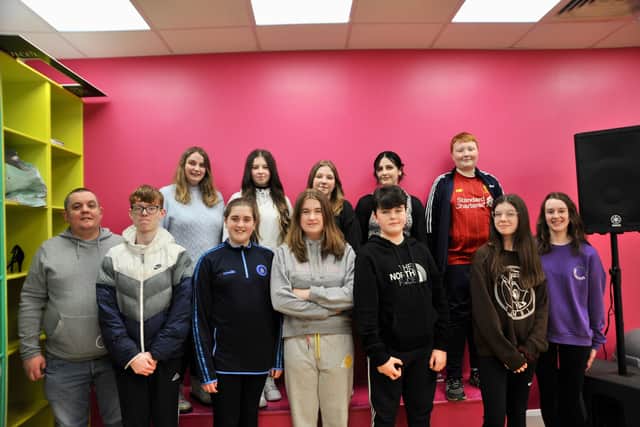 The young people in Studio 2 who are behind the Mental Health podcast 'Spill the Tae'. Pictured also is youth leaders Roma Harvey and Alex Duffy.