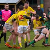City of Derry’s Ross McLaughlin fights off a chasing Bruff pack at Judges Road on Saturday afternoon last. Photo: George Sweeney. DER2208GS – 113
