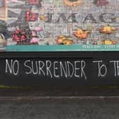 2019: Graffiti relating to Brexit at a peace Wall in Belfast. Photo Colm Lenaghan/Pacemaker Press