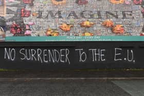 2019: Graffiti relating to Brexit at a peace Wall in Belfast. Photo Colm Lenaghan/Pacemaker Press