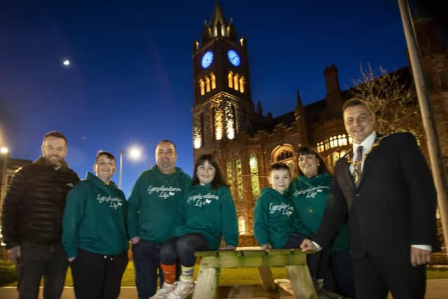 LYMPHOEDEMA WEEK. . . . .The Mayor of Derry City and Strabane District Council Graham Warke pictured with the Tierney family - Brian, Cheryl and their children Shane, Mary-Kate and Ben at the Guildhall on Sunday night as it was illuminated in blue to mark Lymphoedema Week (6-11 March). Included is Colum Eastwood, Foyle MP.