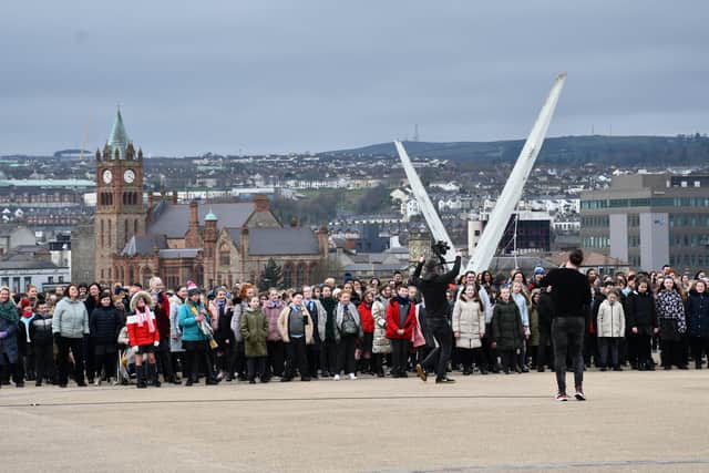 Pupils from 11 local primary and secondary schools gathered at Ebrington Square for a mass recording of songs which will feature in Walled City Passion in Derry tjis Easter. They were joined by producers Jonathan Burgess, Archdeacon Robert Miller and Paul McKay.